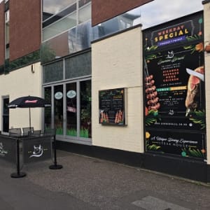 Market Ready - Front of a restaurant showing the menu and signage